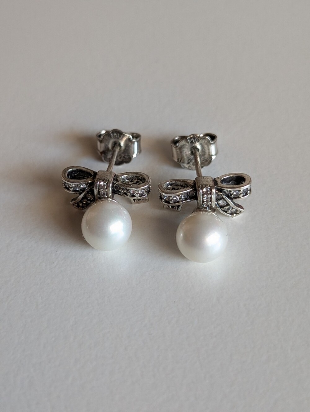 PANDORA Sterling Silver Bow Pearl Dangling Stud Earrings ALE 925